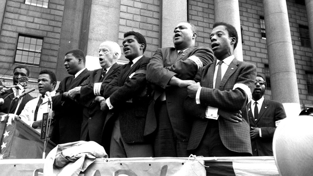 African Americans Holding Hands And Singing The Black National Anthem